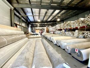 Flooring products in big showroom | Off-Price Carpet Outlet