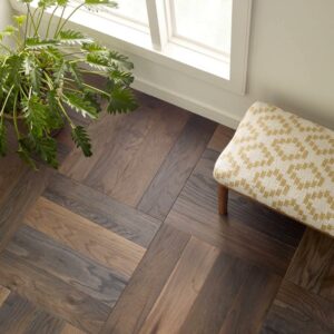 Brown hardwood floor by window | Off-Price Carpet Outlet
