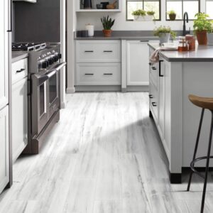 White vinyl flooring in white kitchen | Off-Price Carpet Outlet