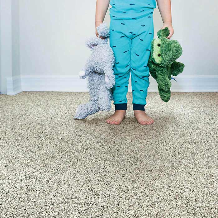 kid with carpet | Off-Price Carpet Outlet